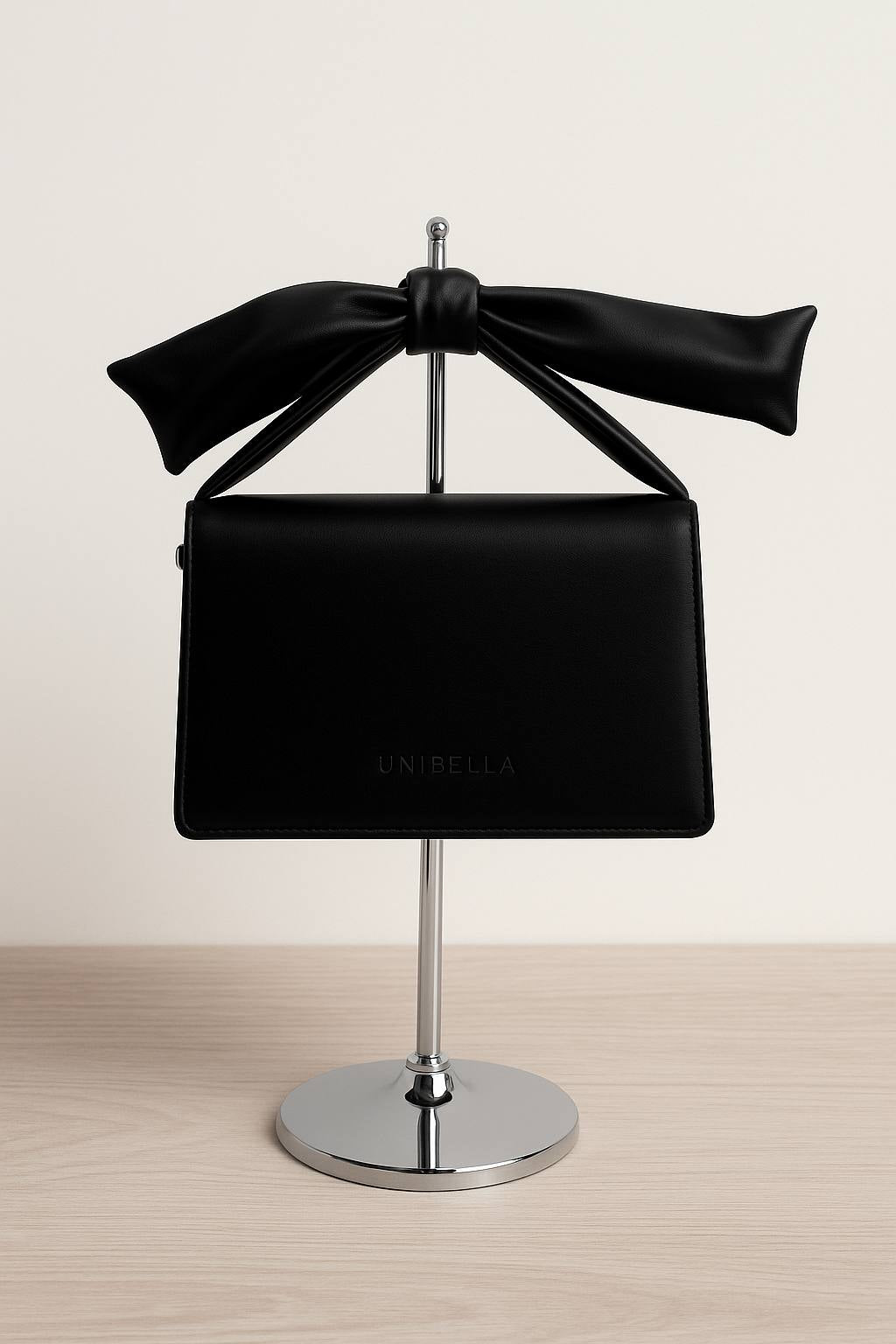 UNIBELLA „Bow Noir“ – elegantiška juoda rankinė